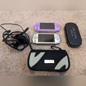 Two PSP's. 1 case. 1 charger. 1 case that holds up to 8 games. 8 games & 1 movie